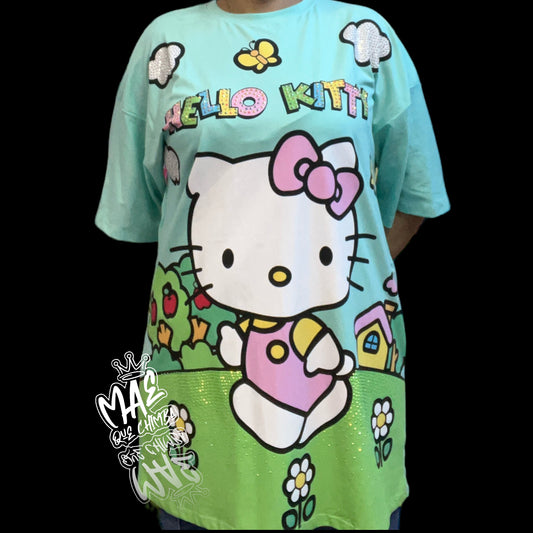 Blusón oversize Hello kitty mariposas verde agua